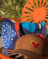 Tattoo Heart Canvas Trucker Hat | Melvin Roy