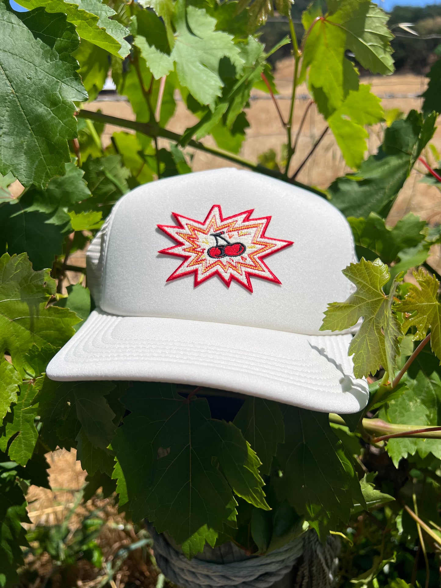 Cherry Bomb Trucker Hat | Cream | Melvin Roy