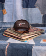 Mini Mel Guitar Black Trucker Hat